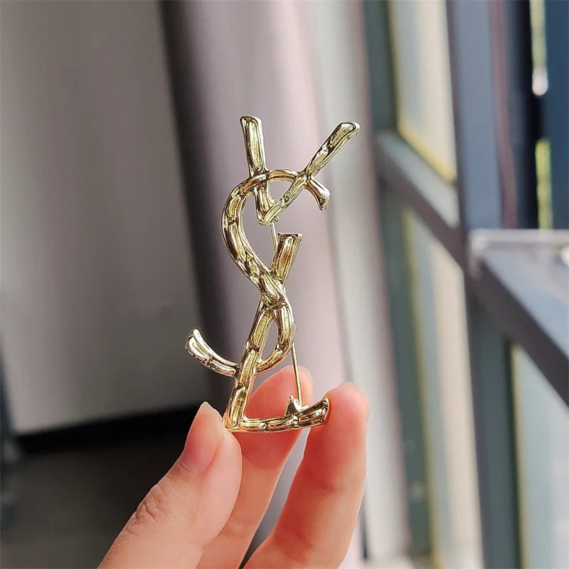 YSL brooch