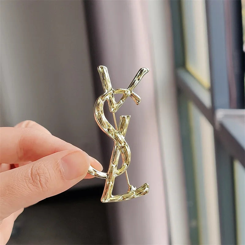 YSL brooch