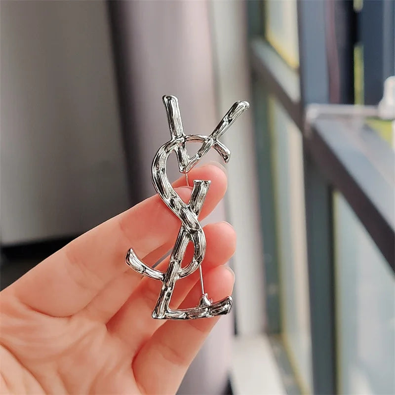 YSL brooch