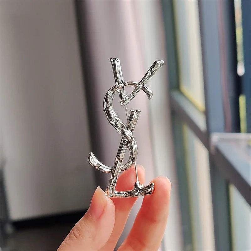 YSL brooch