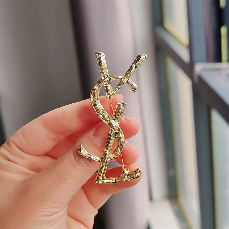 YSL brooch