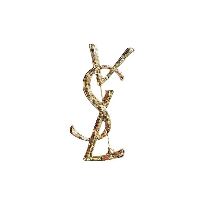 YSL brooch