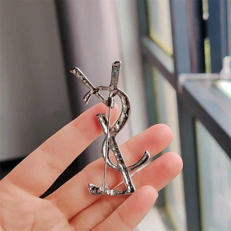 YSL brooch