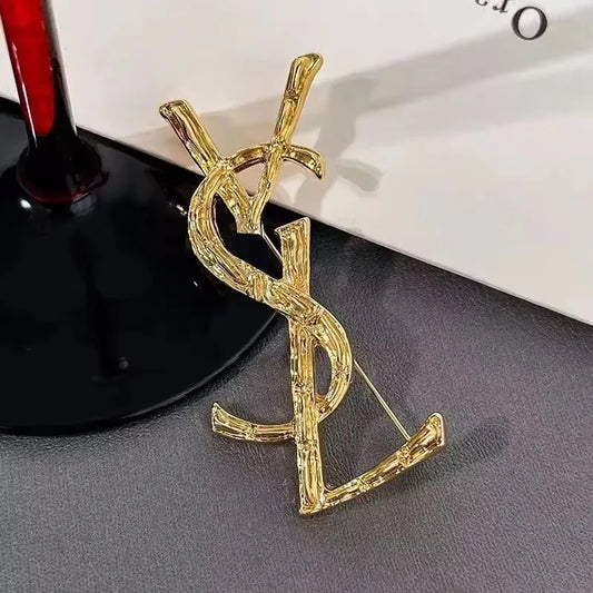 YSL brooch