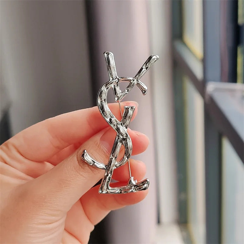 YSL brooch